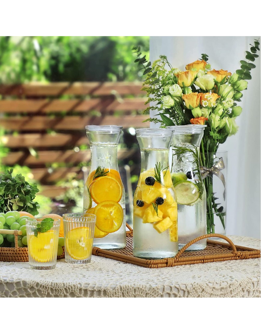 NETANY Set of 4 Glass Carafe with Lids 1 Liter Beverage Pitcher Carafe for Mimosa Bar Brunch Cold Water Juice Milk Iced Tea Lemonade 4 Wooden Chalkboard Tags Included